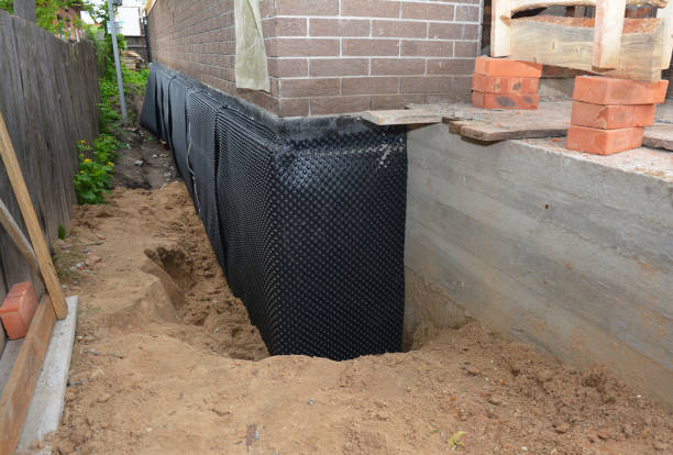 SJ Waterproofing Pros technician performing targeted Waterproofing assessment in Brookfield, IL